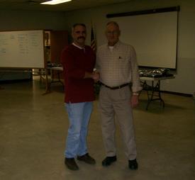 Chief D. wagoner presents Chief Bill Allen his 50 yr. pin