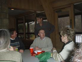 Doug and Timmy exchanging stories at the Christmas party