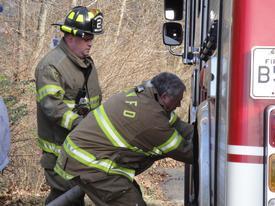 Asst. Chief Mitchell pumping engine 23 on Fernridge