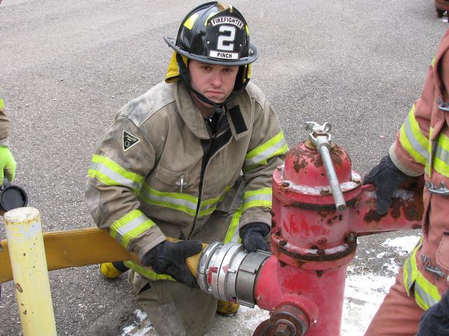 FF Coon learning how to catch a hydrant